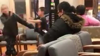 Boy hitting his mom at the doctors office