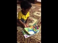 Sairahul Reading Barney Book