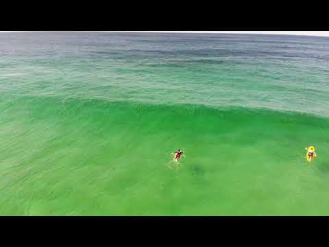 Drone footage of surfers and surrounding waters at Boomerang Beach