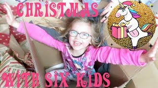 Opening Christmas Presents with 6 Kids!! | Crazy8Family
