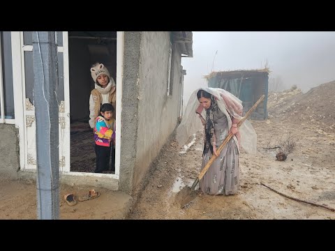 Behnaz, a Lone Nomadic Woman in the Middle of a Mountain Storm and Heavy Rain
