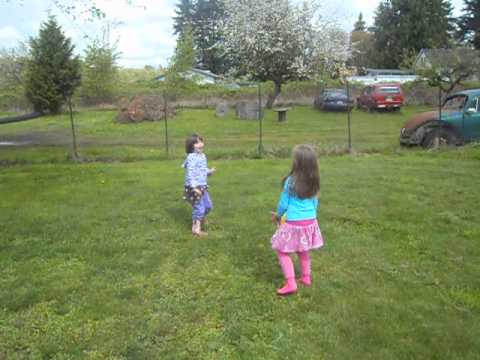 Anna Grace & Johannes playing with children at fruit stand