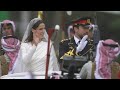 Crown Prince Hussein, Rajwa Al Saif wave to Jordanians celebrating royal wedding | AFP