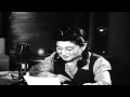 Iva Toguri D'Aquino (Iva Ikuko Toguri) reads propaganda from Radio Tokyo and talk...HD Stock Footage
