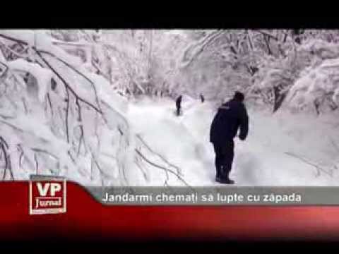 Jandarmi chemați să lupte cu zăpada