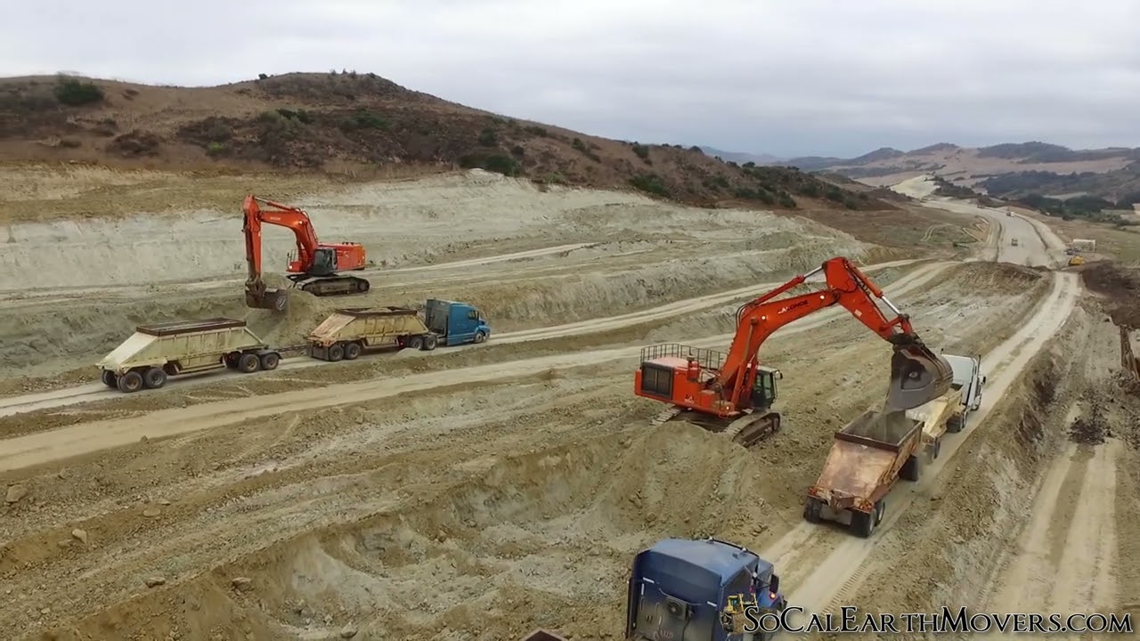 Hitachi 850 Excavators loading bottom dumps