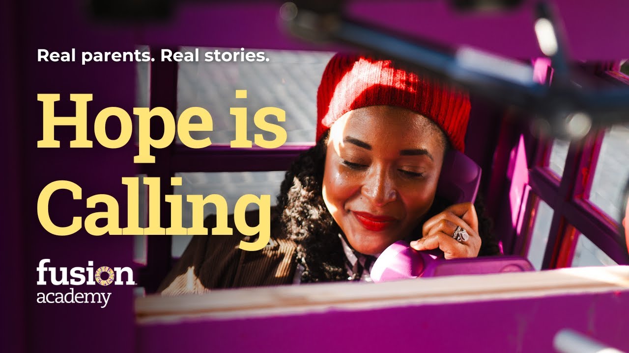 A purple phone booth installed in New York City for Fusion Academy's Hope is Calling campaign