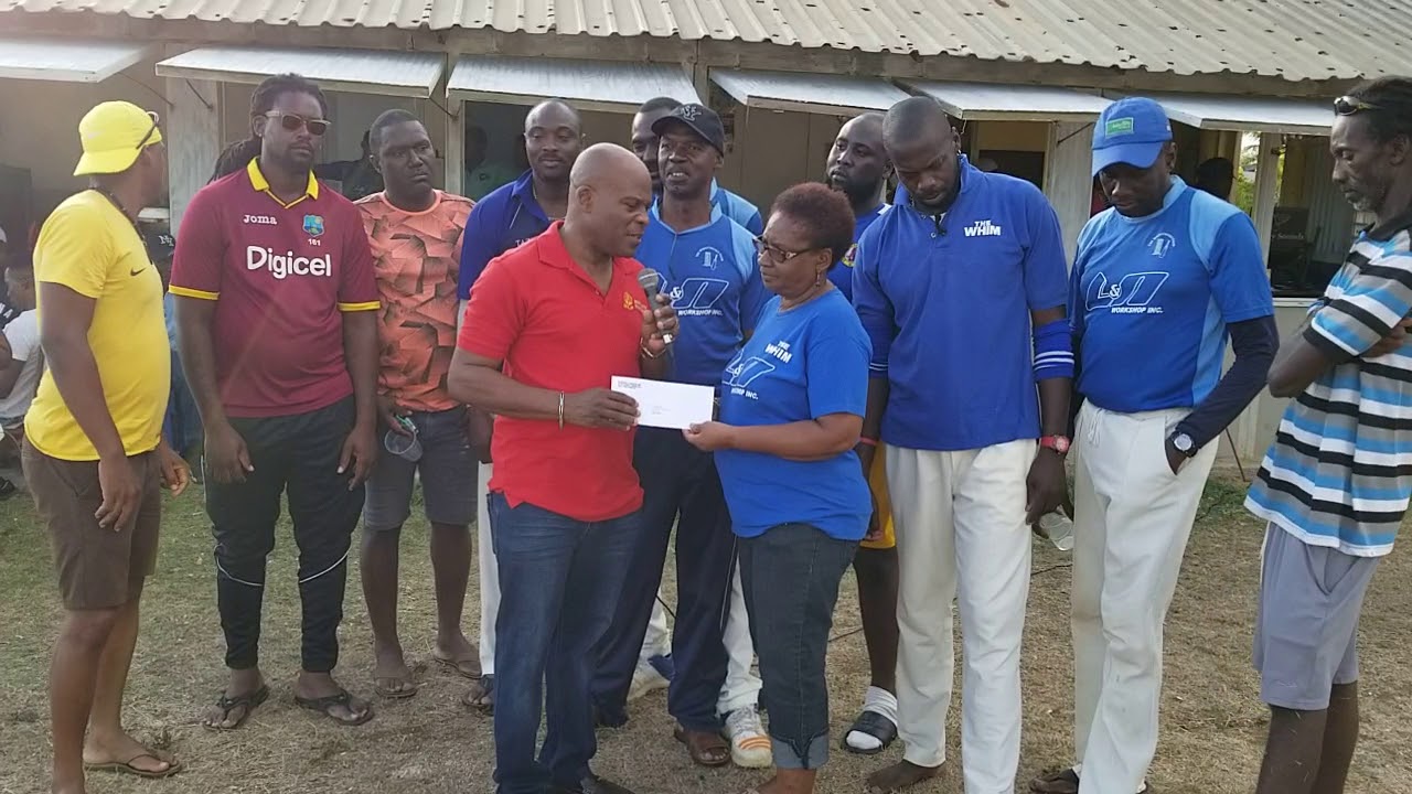 Presentation of a donation to The Whim Cricket Club