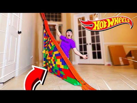 50FT HOT WHEELS RAMP OBSTACLE COURSE!