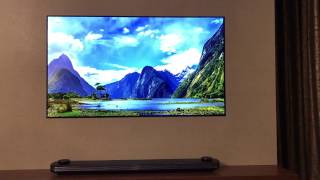 Dolby Atmos soundbar on LG wallpaper OLED