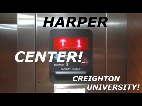 Metal Aurora buttons!  ThyssenKrupp traction elevators at Harper Center, CU, Omaha NE