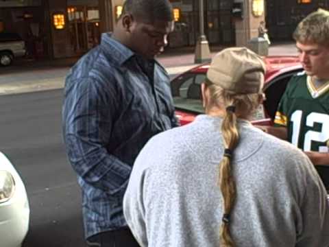 C J Wilson signing autographs