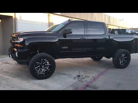 Mcgaughys 7-9” Lift on a 2017 Chevy 1500 with 22x10 Hostile Alpha wheels and 35” Toyo RT Tires
