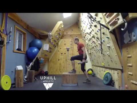Coach demonstrating a box step-up, from the Uphill Athlete strength demo