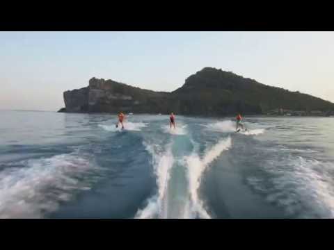 Sea Ray 200 with 3 waterskiers in lake Garda