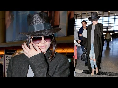 Kendall Jenner Tries To Conceal Herself Through LAX