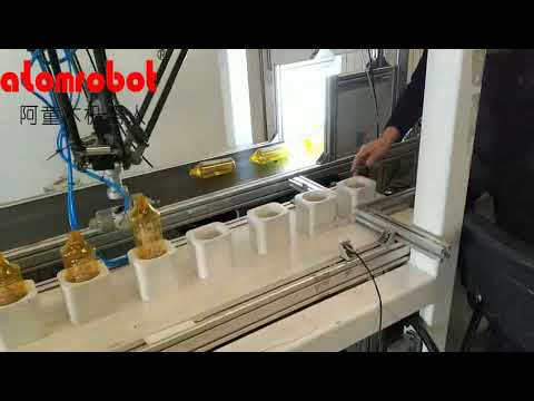 Delta robot-bottle unscrambler from Atomrobot
