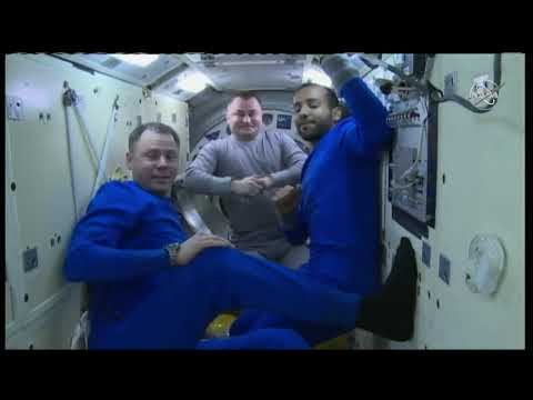 Homebound Crew Boards Soyuz Crew Ship, Closes Hatch