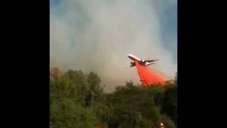 preview picture of video 'DC-10 dropping on Old Potato Road Fire in Bastrop County'