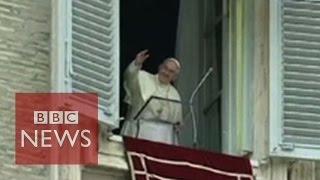Pope Francis: Global warming a threat and urges action - BBC News