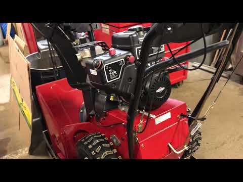 Spark plug location on a 9hp Briggs and Stratton Snow...