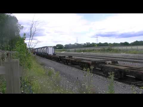 Irish Rail 201 loco 215 + IWT Liner passes Stacummy Bridge inbound