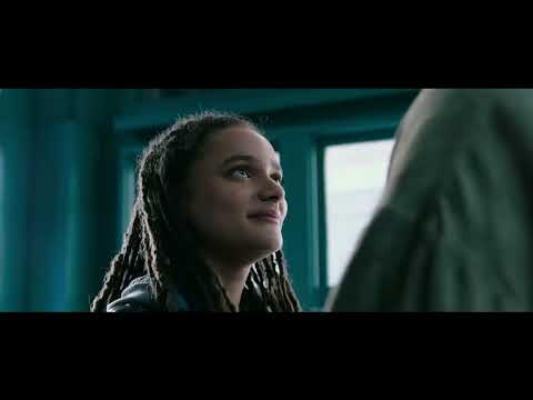 Trailer frame of Hellboy charging giants across a moor, echoing the score’s hard-driving ostinatos