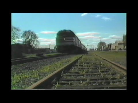 1076. AMTRAK # 14 at Junction City Oregon in March 1989 with 2 passenger engine motive power units