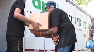 KPRC 2 helps Houston Food Bank deliver hundreds of food boxes to N. Houston apartments after day...