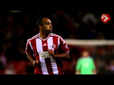 Blades v MK Dons - action photos