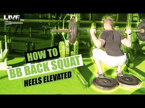 How To Do A BARBELL BACK SQUAT WITH HEELS ELEVATED | Exercise Demonstration Video and Guide