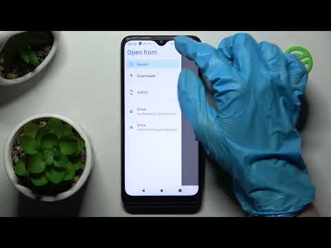 How to Set Up Alarm Clock in TCL 205?