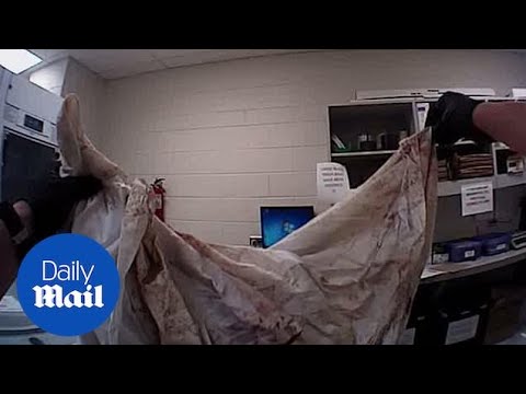 Police unwrap the bloodied clothes of Chris Watts' murdered wife