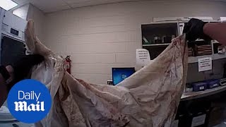 Police unwrap the bloodied clothes of Chris Watts&#39; murdered wife