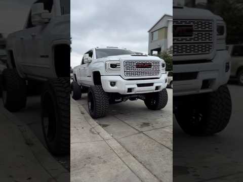 2017 GMC 2500HD sitting on our 7-9” @McGaughys Suspension lift.