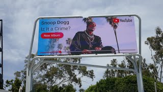 Snoop Dogg Iz It A Crime? New Album YouTube Billboard Sunset Blvd Los Angeles CA USA May 16, 2025