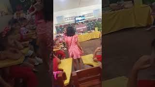 GIVING OF PRIZES WHO WON THE CHRISTMAS CARD COLORING FOR GRADE 1