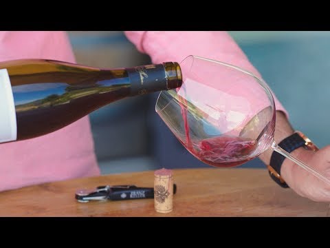 How do you taste wine properly?