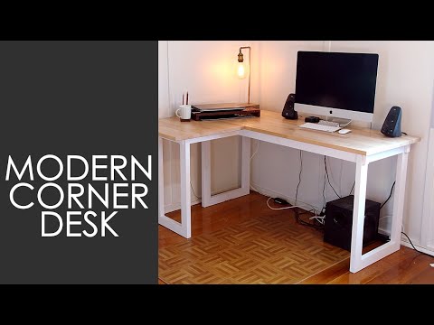 Part of a video titled How To Make A Corner Desk On A Budget | Woodworking - YouTube