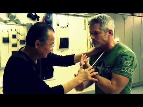Practical Wing Chun Sifu Wai breaking chopstick on throat.