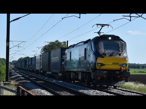 Class 88 002 DRS passes Yaxley Lode working 4Z45 Daventry Int Rft Recep Fl - Mossend Down Yard.