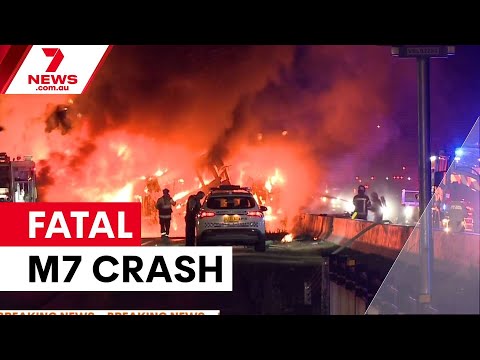 Truck driver dies in fiery M7 crash | 7NEWS
