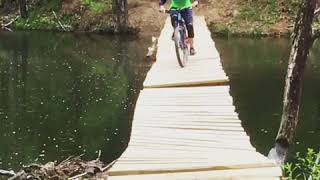 Maja stays focused on sketchy floating bridge.