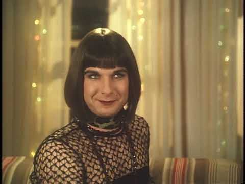 Mixed Nuts (1994) trailer frame with Steve Martin and Venice Beach holiday lights