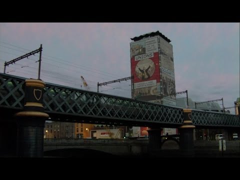 IE 22000 Class Intercity Train crossing the River Liffey in Dublin