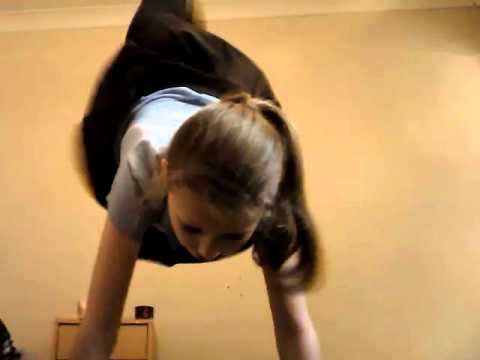 attempting to do a chartwheel and a handstand! 