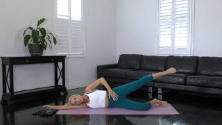 At home Pilates mat-based workout with resistance band. Apartment friendly.