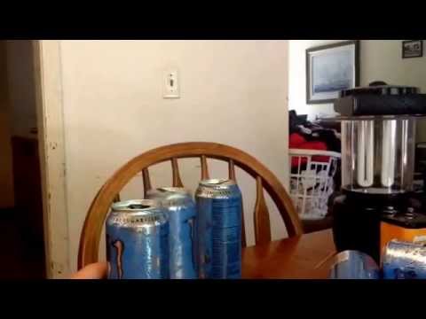 Cans falling down while rock music plays.