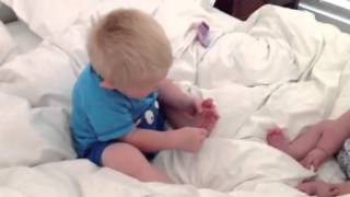 One year old using tweezers to remove a splinter!