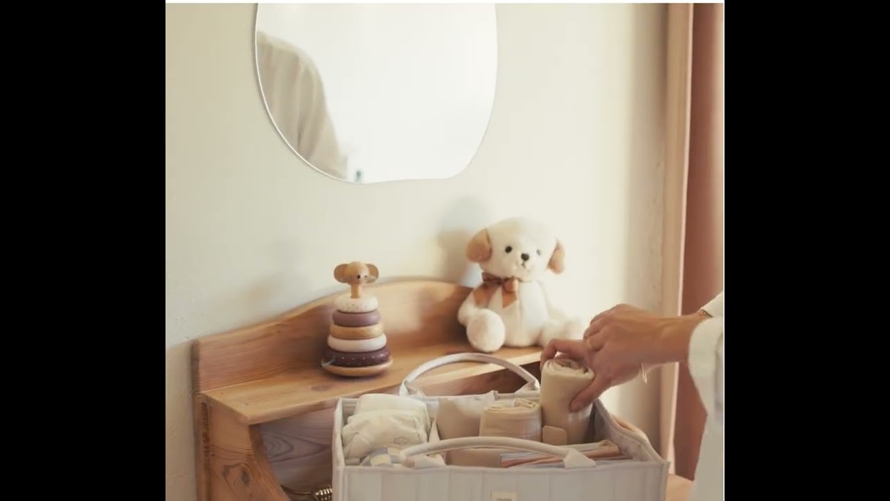 Panier Mushie ivoire — rangement essentiels bébé